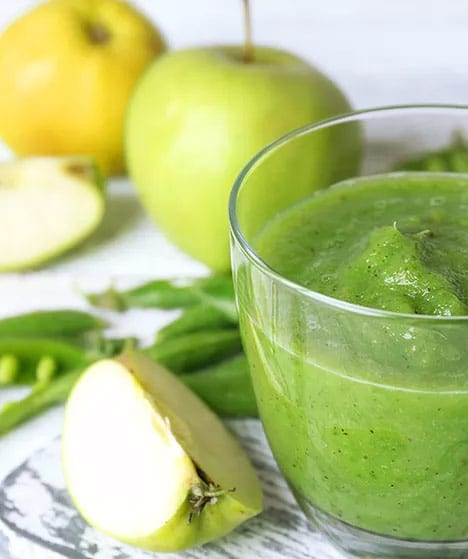 Sliced Green Apples and a Green smoothie
